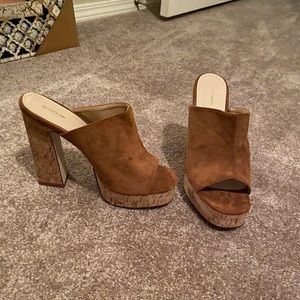 Suede heels. Never worn.